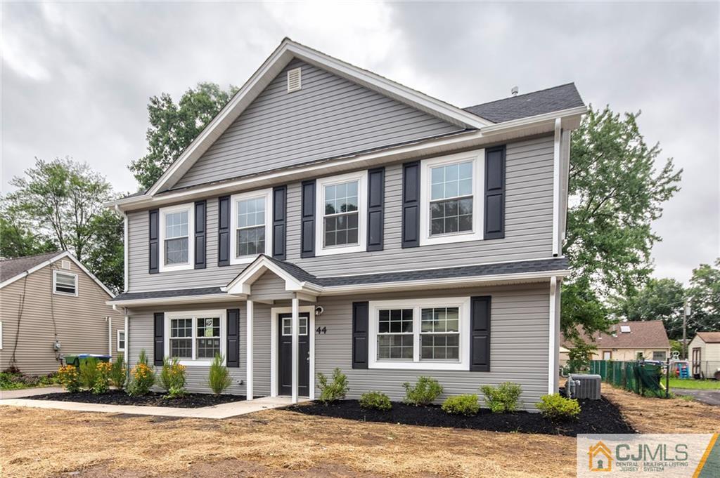 44 Caldwell Road Edison, NJ 08817 - Photo 2 of 25 a front view of a house with a yard