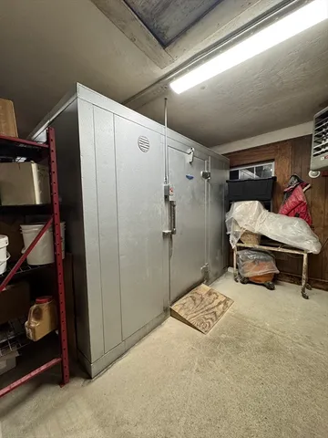 a kitchen with stainless steel appliances granite countertop a stove and a refrigerator