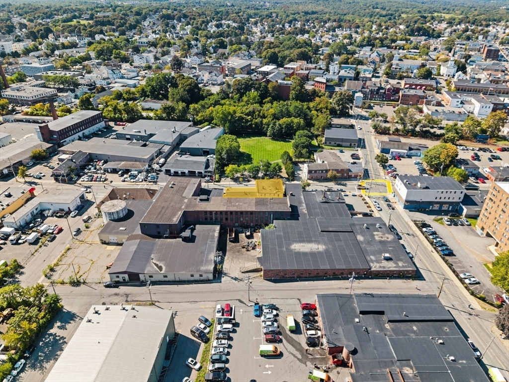 46-48 Walnut Street Peabody, MA 01960 - Photo 6 of 25 an aerial view of residential houses with outdoor space