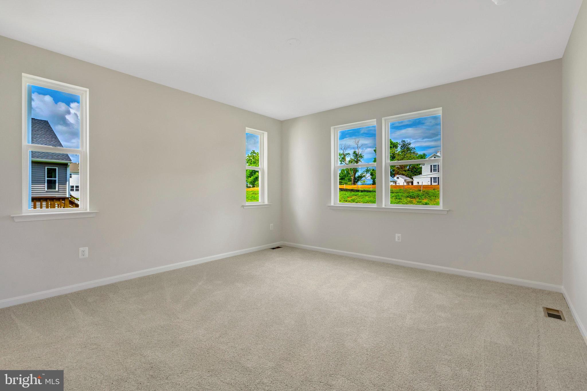 100 Midsummer Lane Middletown, VA 22645 - Photo 25 of 47 a view of an empty room with a window