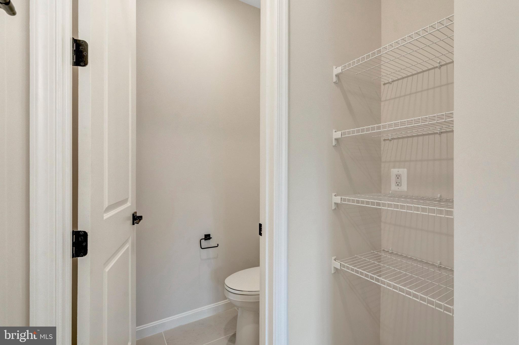 100 Midsummer Lane Middletown, VA 22645 - Photo 30 of 47 a bathroom with a sink and toilet
