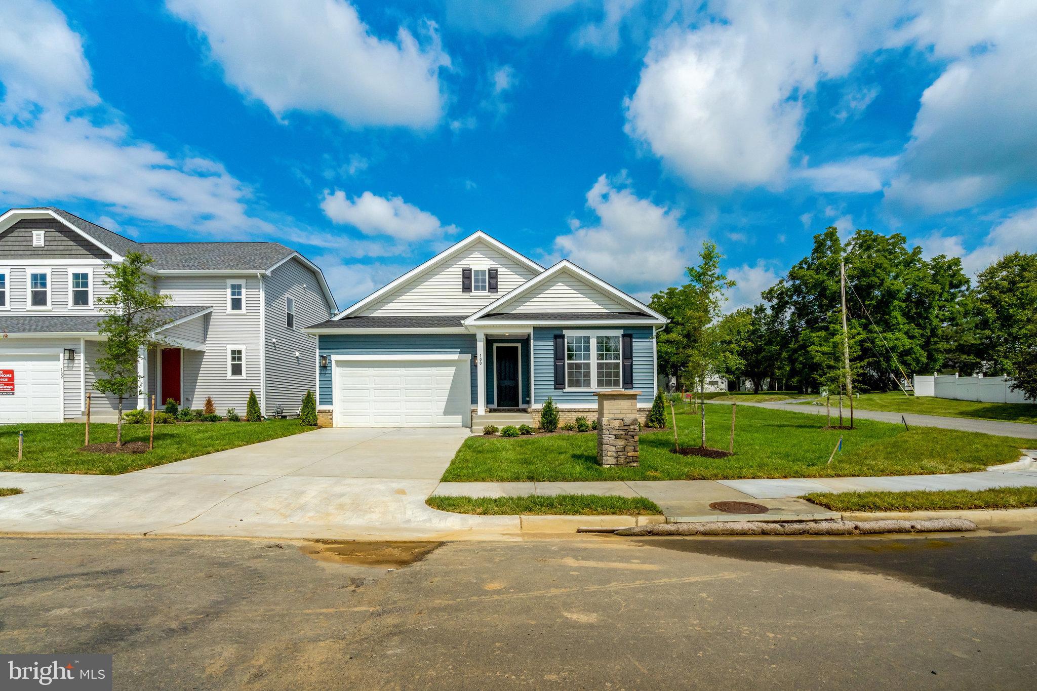100 Midsummer Lane Middletown, VA 22645 - Photo 4 of 47 a front view of a house with a yard