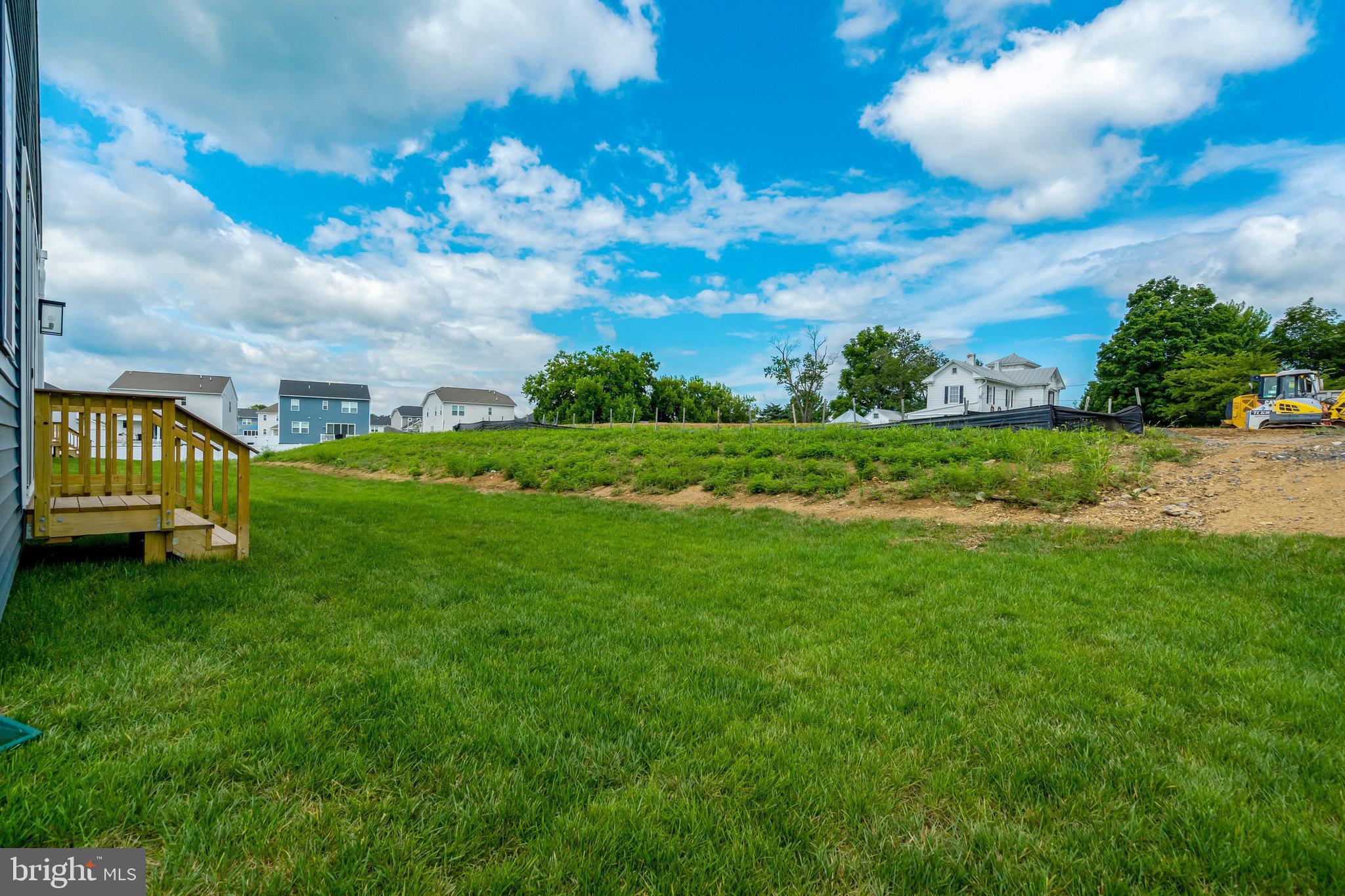 100 Midsummer Lane Middletown, VA 22645 - Photo 47 of 47 a view of a garden with a house in the background