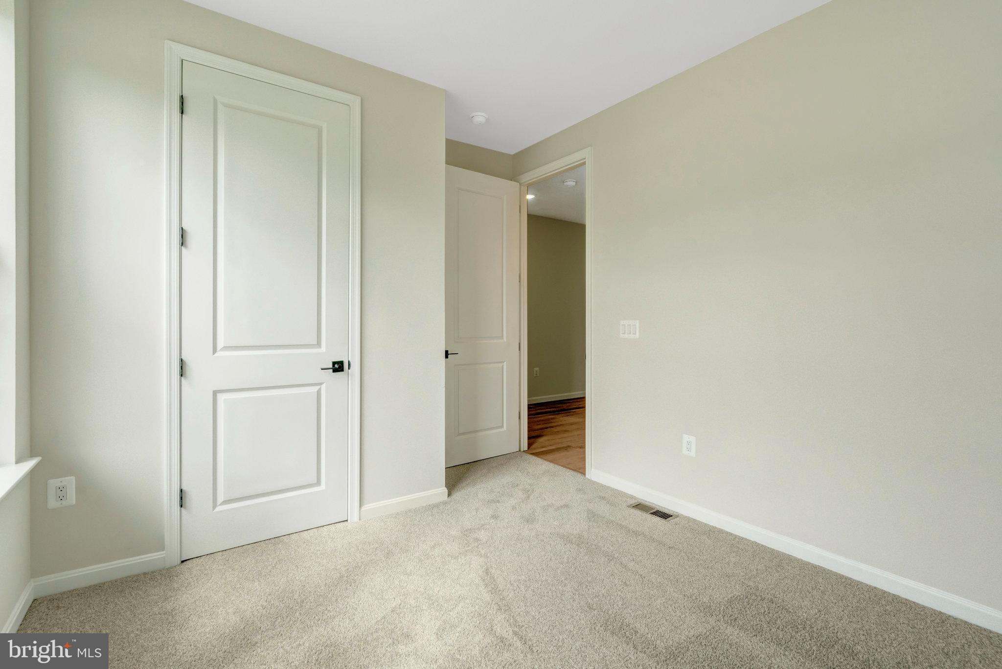 100 Midsummer Lane Middletown, VA 22645 - Photo 9 of 47 an empty room with closet area