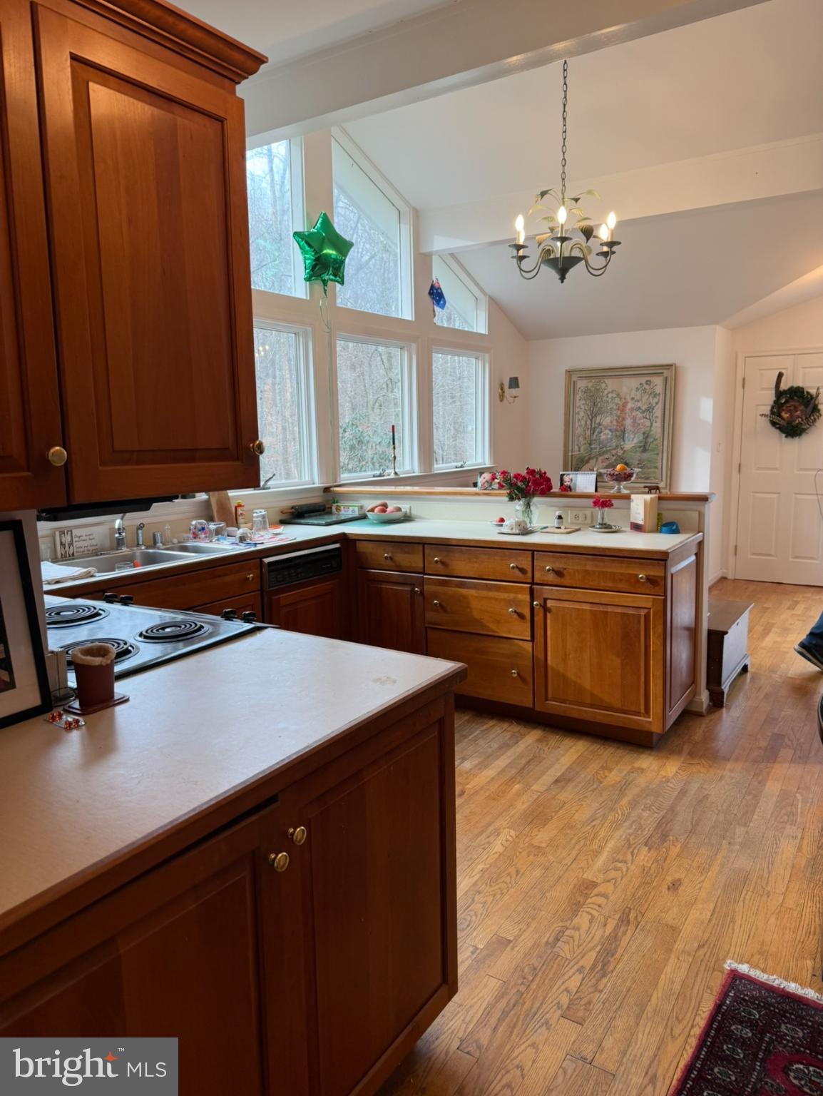 1130 Bellview Road McLean, VA 22102 - Photo 3 of 6 Warm wood tones in a sunlit kitchen.