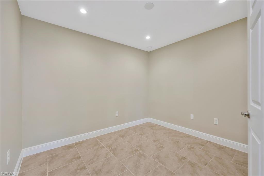 18225 Creekside Preserve Loop, Unit 102 Fort Myers, FL 33908 - Photo 20 of 25 Unfurnished room featuring baseboards and recessed lighting