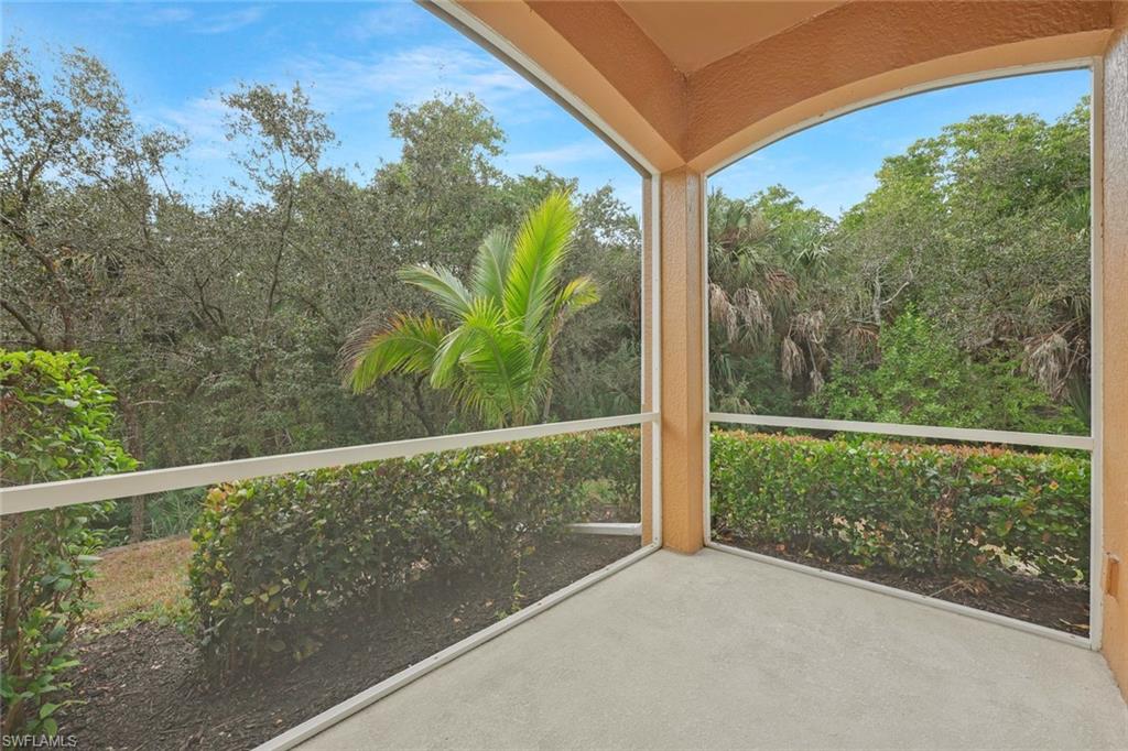 18225 Creekside Preserve Loop, Unit 102 Fort Myers, FL 33908 - Photo 21 of 25 View of unfurnished sunroom