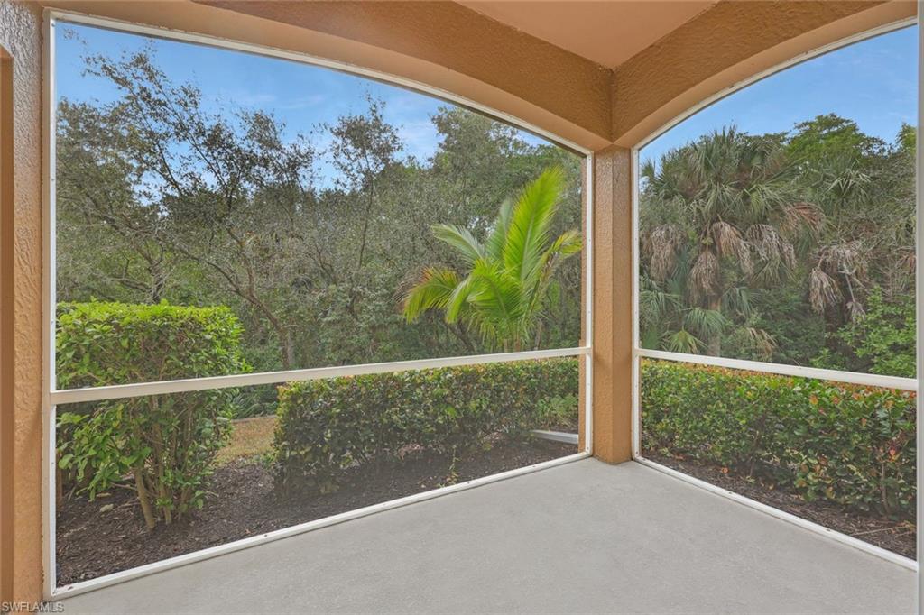 18225 Creekside Preserve Loop, Unit 102 Fort Myers, FL 33908 - Photo 23 of 25 View of unfurnished sunroom