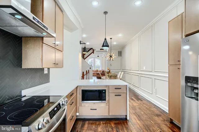 a bedroom with a bed and a night stand