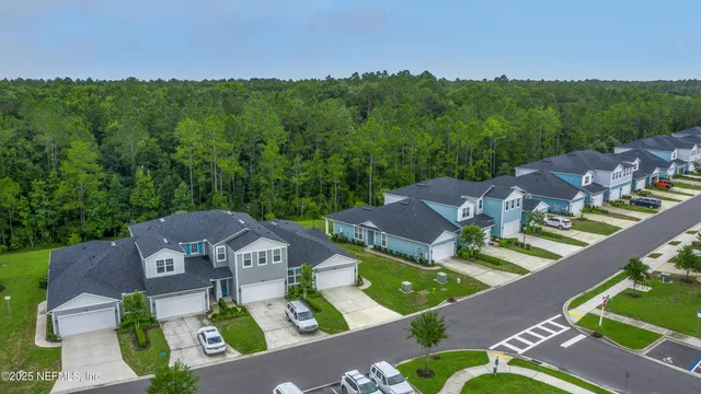 a view of a house with a big yard