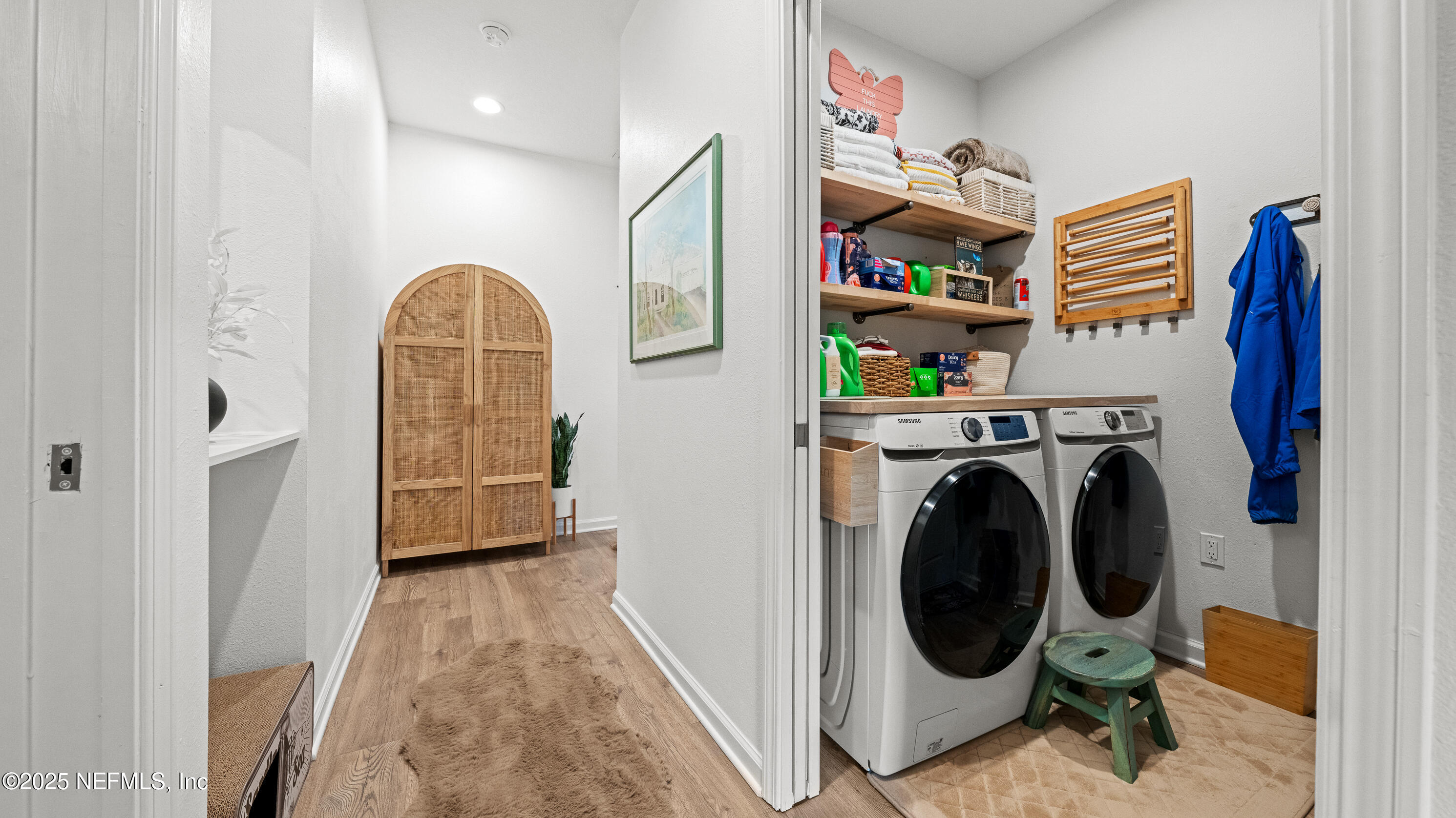 327 Charlie Way St. Augustine, FL 32095 - Photo 13 of 22 a view of a hallway with washer and dryer