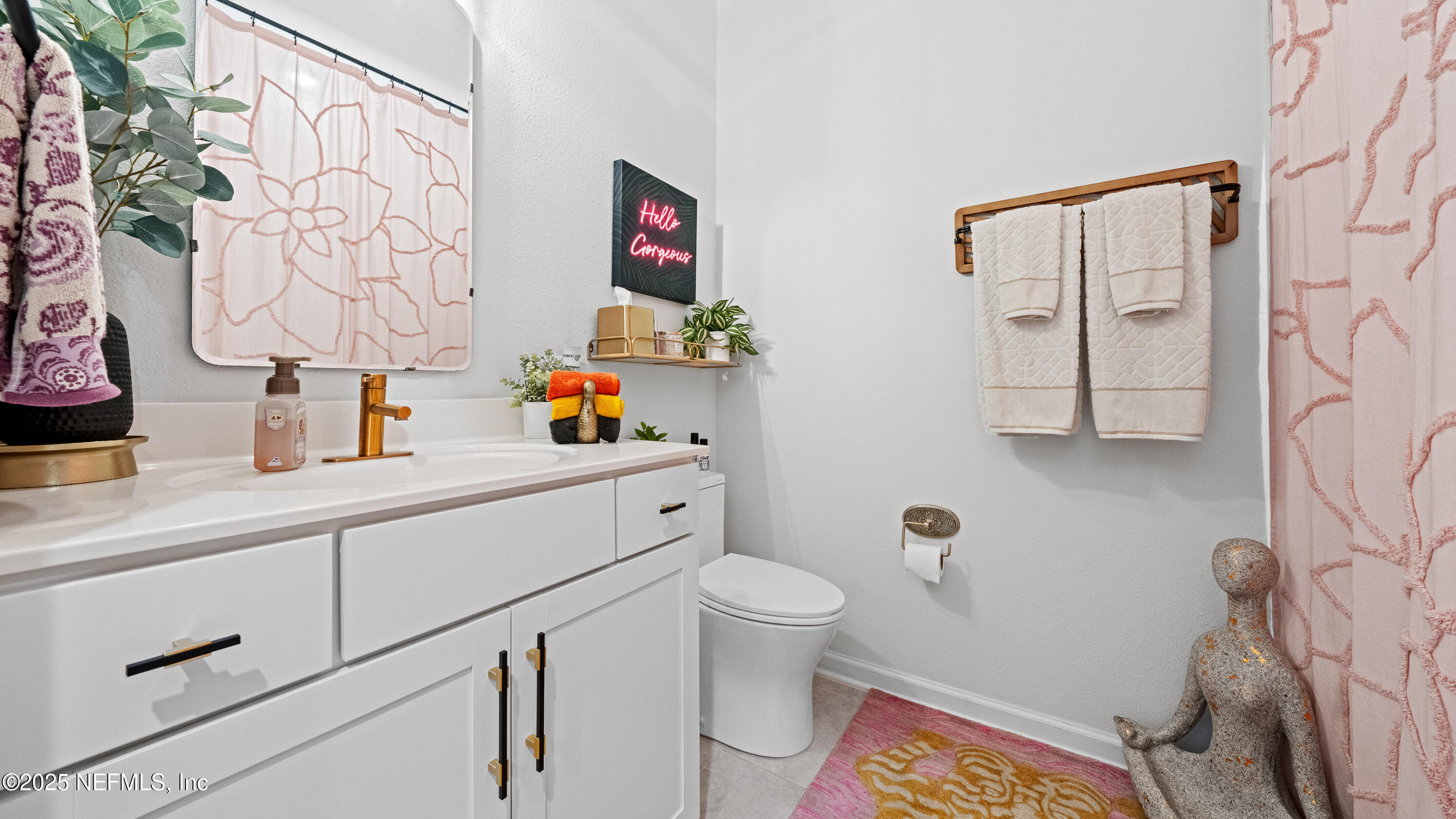 327 Charlie Way St. Augustine, FL 32095 - Photo 15 of 22 a bathroom with a sink and a toilet