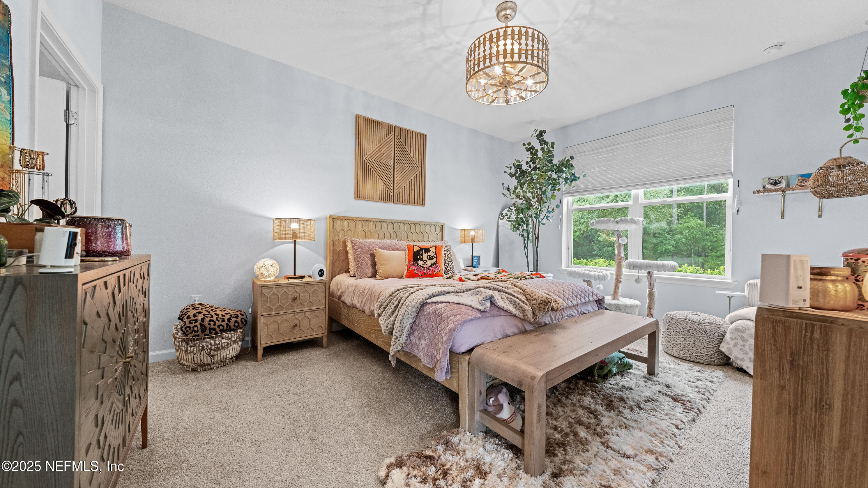 327 Charlie Way St. Augustine, FL 32095 - Photo 18 of 22 a bed room with a bed and a window