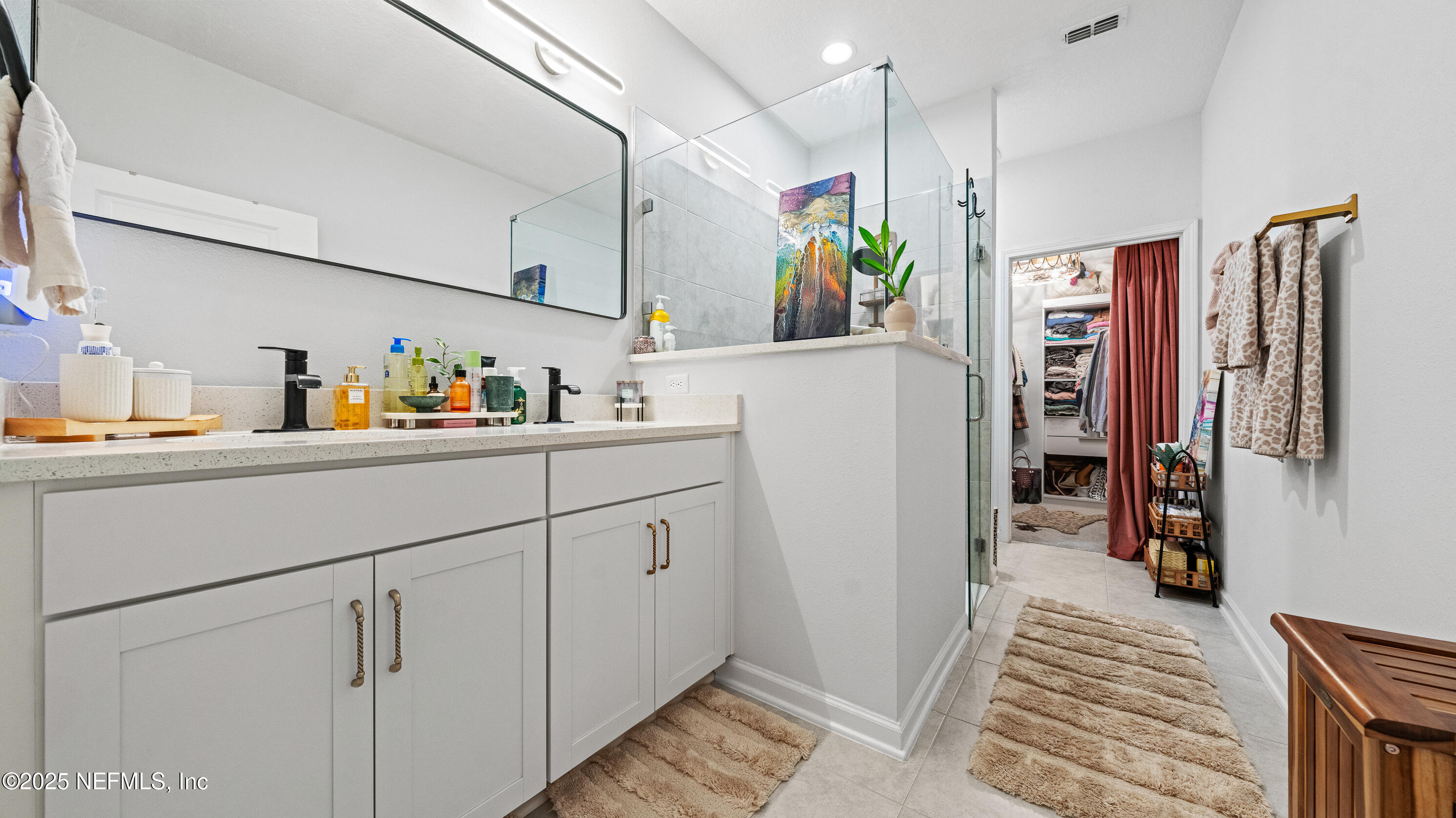 327 Charlie Way St. Augustine, FL 32095 - Photo 19 of 22 a utility room with cabinets washer and dryer