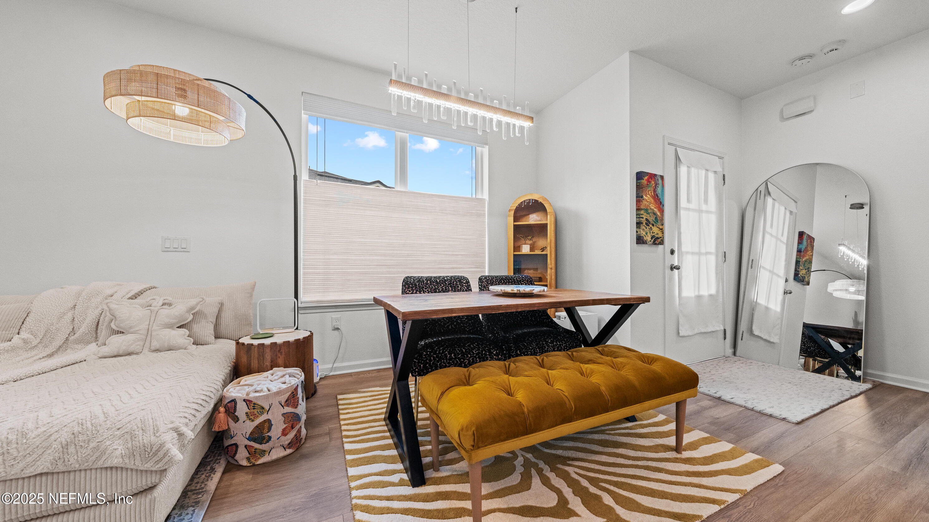 327 Charlie Way St. Augustine, FL 32095 - Photo 5 of 22 a bedroom with furniture and wooden floor