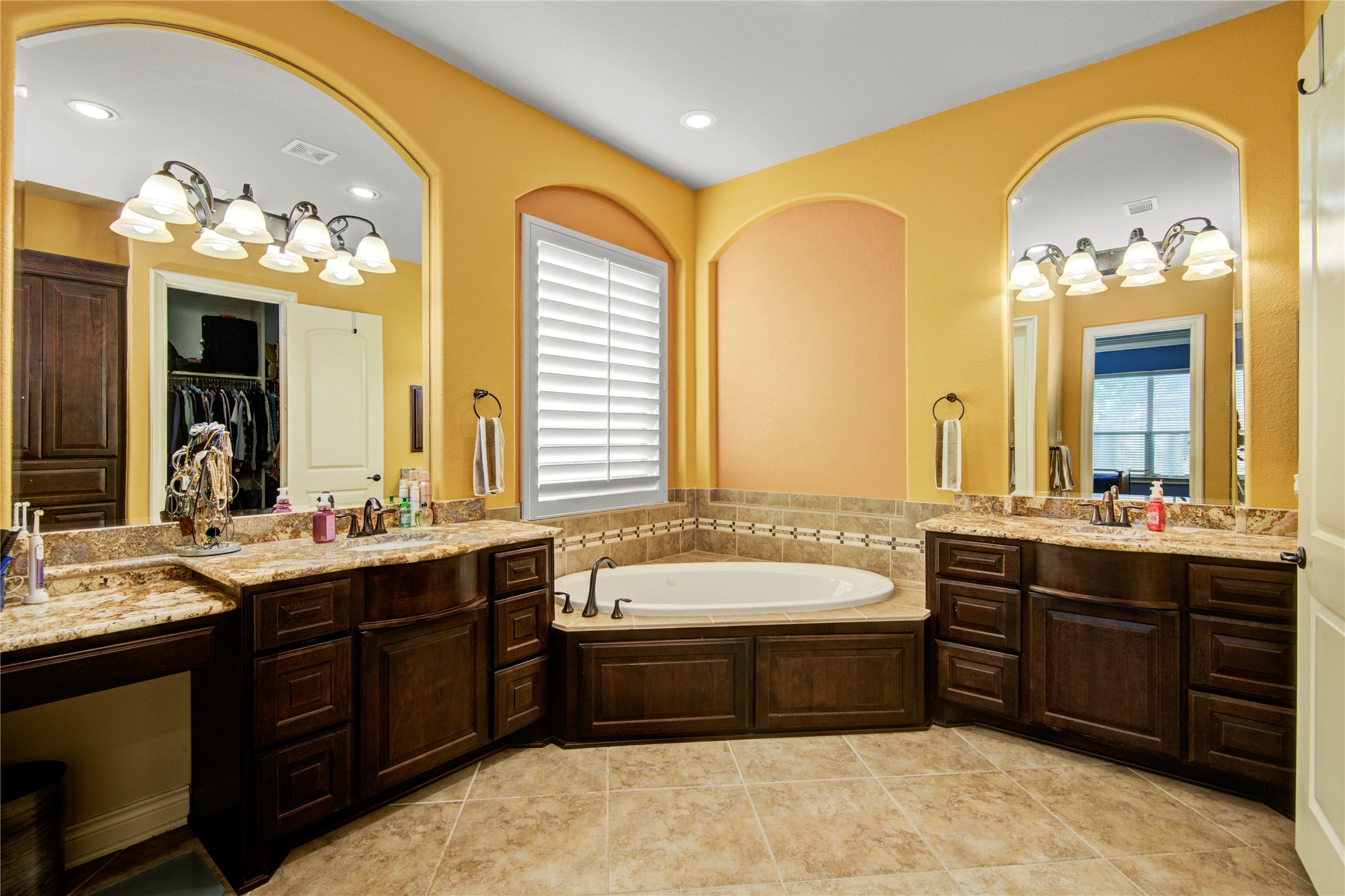 4315 Sanctuary Halls Spring, TX 77388 - Photo 40 of 50 a spacious bathroom with a tub a double vanity sink double and mirror