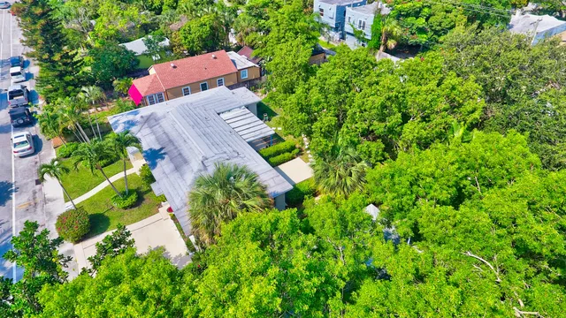 an aerial view of a house with a garden