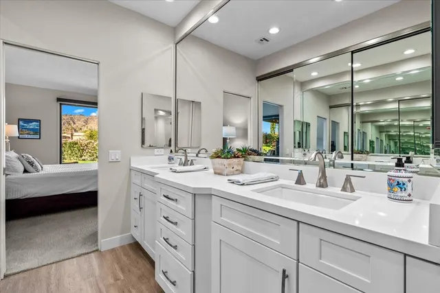 a bathroom with a tub and shower