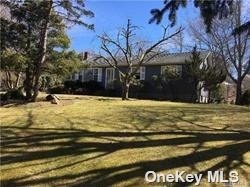 19 Old Riverhead Road Hampton Bays, NY 11946 - Photo 1 of 1 a view of swimming pool with an outdoor space