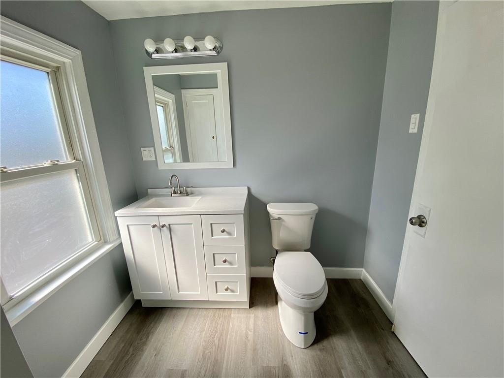 116 Nassau Street Uniontown, PA 15401 - Photo 19 of 25 a bathroom with a toilet sink and mirror