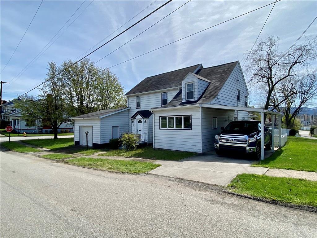 116 Nassau Street Uniontown, PA 15401 - Photo 3 of 25 a house view with a garden space