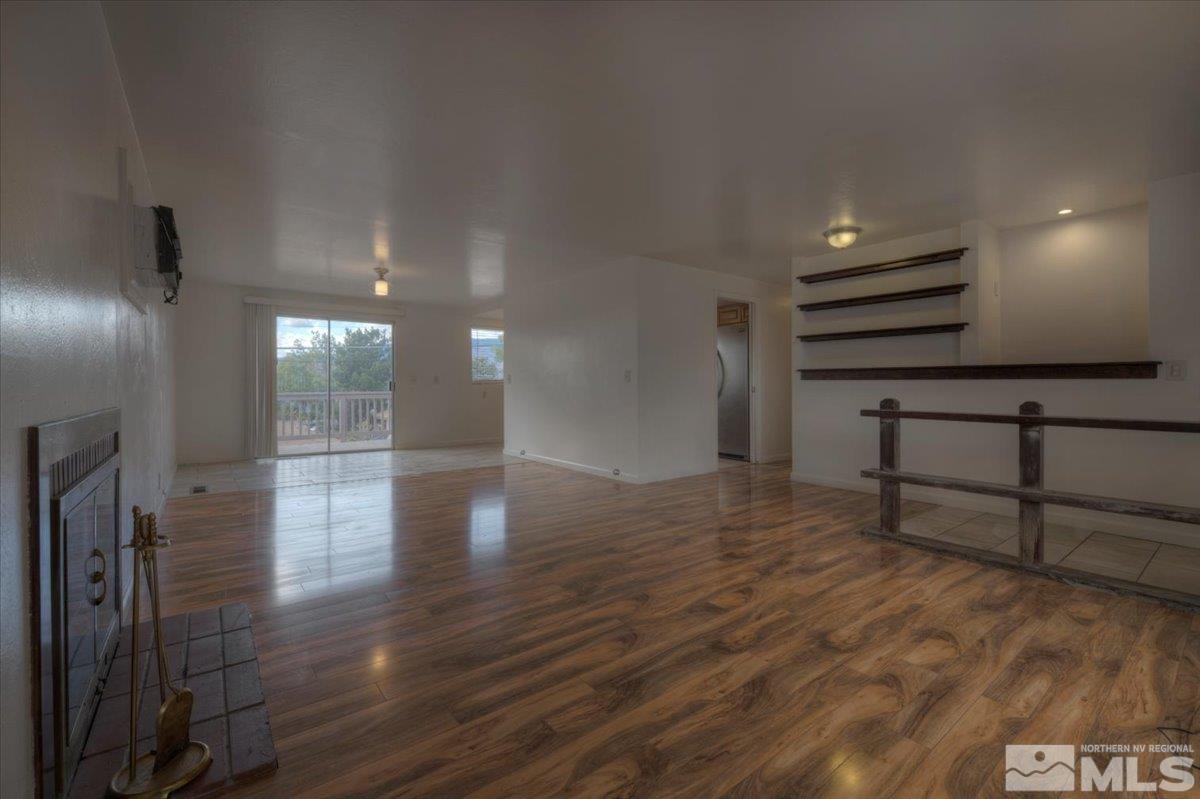 1660 Carlin Street Reno, NV 89503 - Photo 5 of 27 a view of a hallway with wooden floor