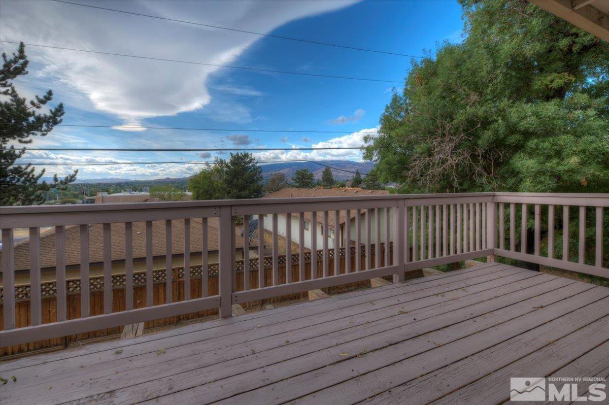 1660 Carlin Street Reno, NV 89503 - Photo 7 of 27 a balcony with wooden floor