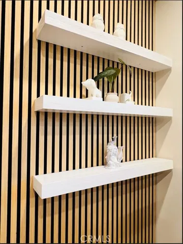 a view of a small white roof deck