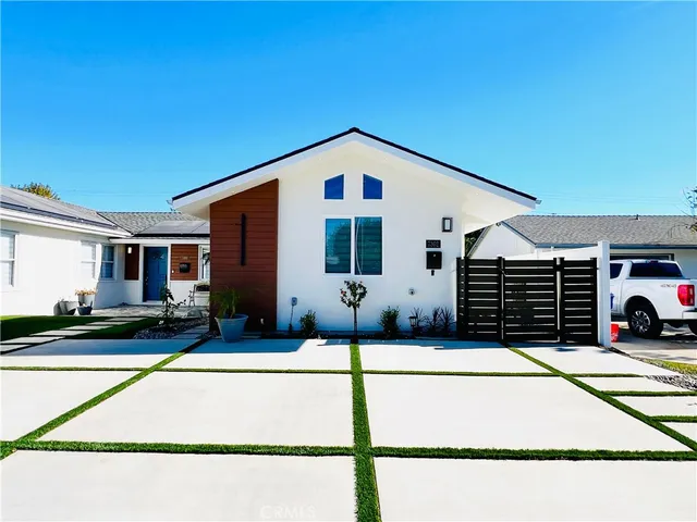 a front view of a house with garage