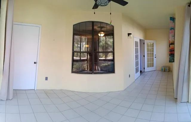 a view of a hallway with entryway