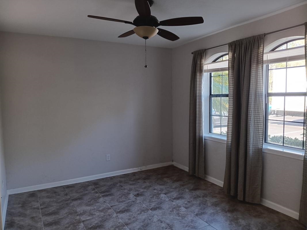 1300 Vista Cove Road St. Augustine, FL 32084 - Photo 7 of 21 an empty room with a window