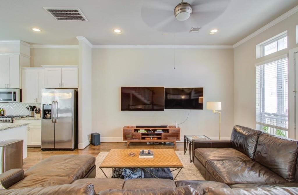 243 West 27th Street Houston, TX 77008 - Photo 13 of 31 a living room with furniture and a flat screen tv