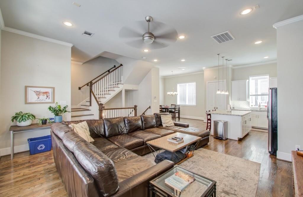 243 West 27th Street Houston, TX 77008 - Photo 14 of 31 a living room with fireplace furniture and a wooden floor