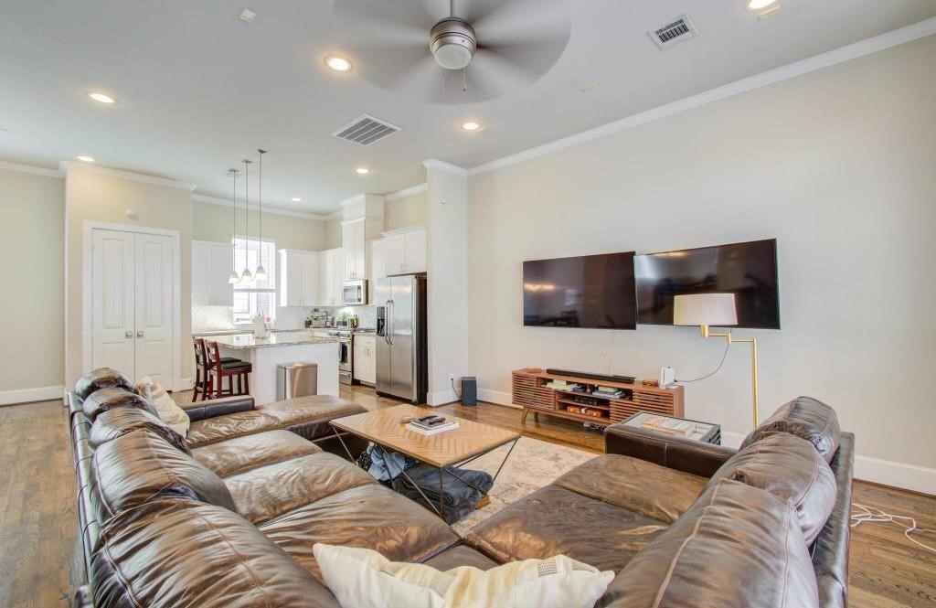 243 West 27th Street Houston, TX 77008 - Photo 15 of 31 a living room with furniture and a flat screen tv