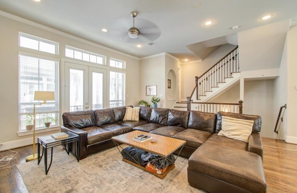 243 West 27th Street Houston, TX 77008 - Photo 2 of 31 a living room with furniture and a large window