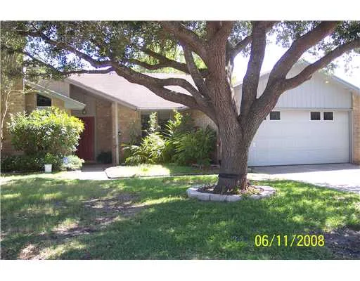 a view of a back yard of the house