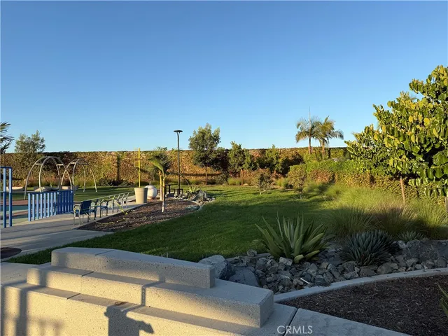 a view of a house with backyard and a window
