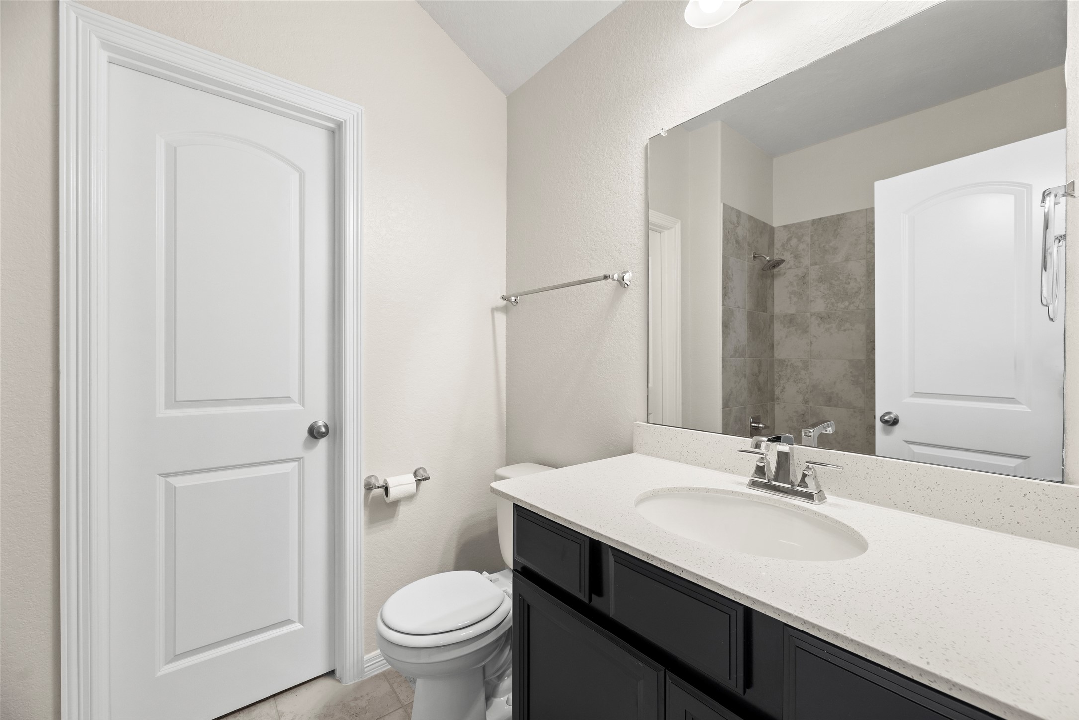 11734 Deepwater Ridge Way Cypress, TX 77433 - Photo 19 of 35 a bathroom with a sink toilet and a mirror