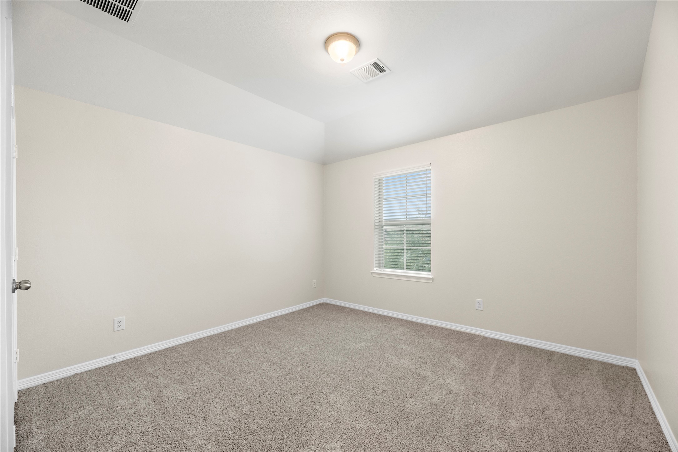11734 Deepwater Ridge Way Cypress, TX 77433 - Photo 21 of 35 an empty room with a empty space and a window