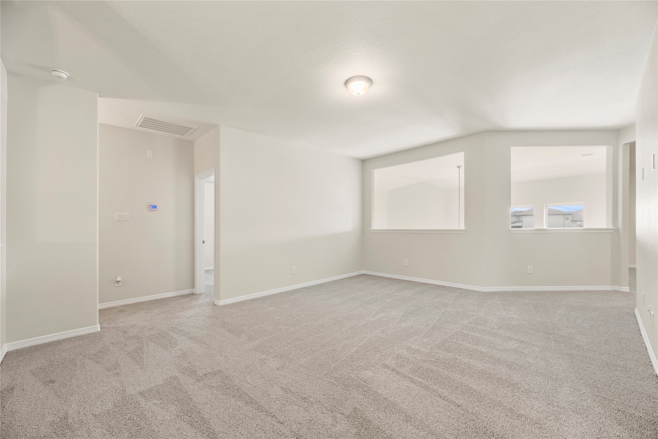 11734 Deepwater Ridge Way Cypress, TX 77433 - Photo 23 of 35 an empty room with windows