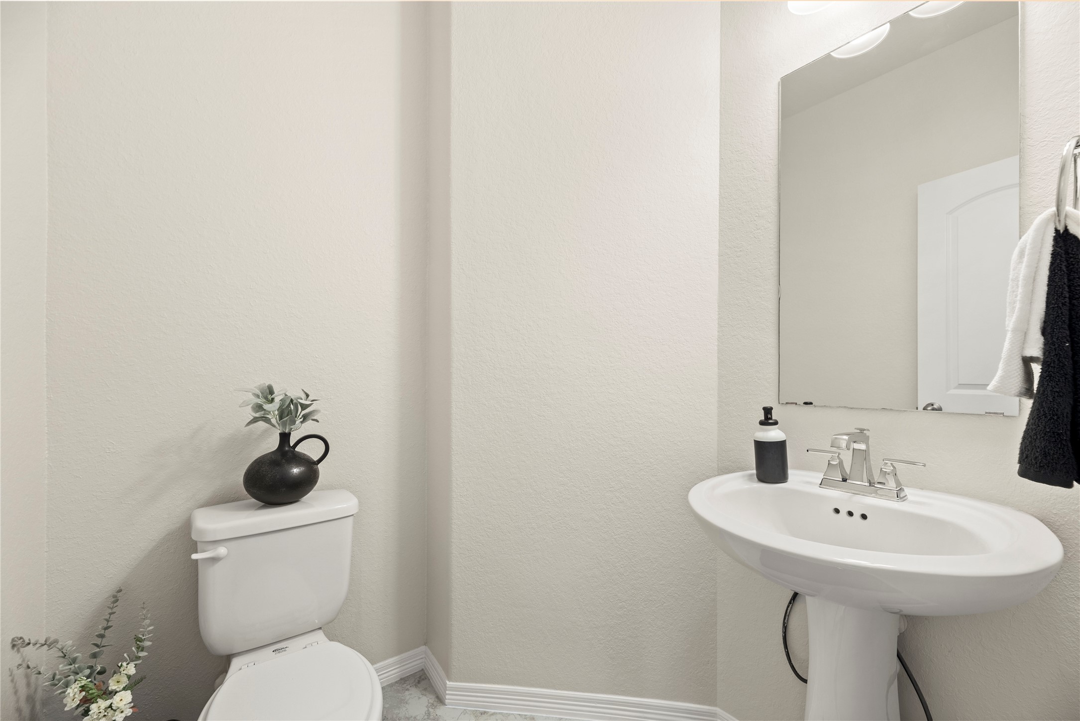 11734 Deepwater Ridge Way Cypress, TX 77433 - Photo 25 of 35 a bathroom with a toilet sink and mirror