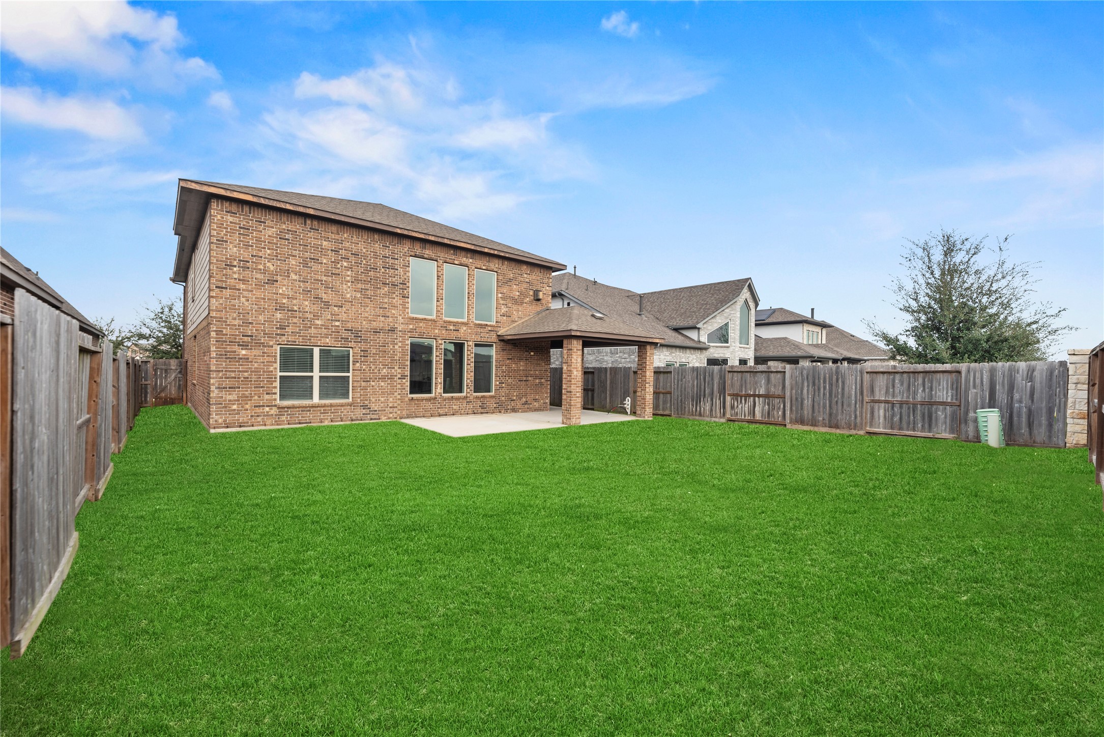 11734 Deepwater Ridge Way Cypress, TX 77433 - Photo 26 of 35 a view of a house with backyard porch and garden