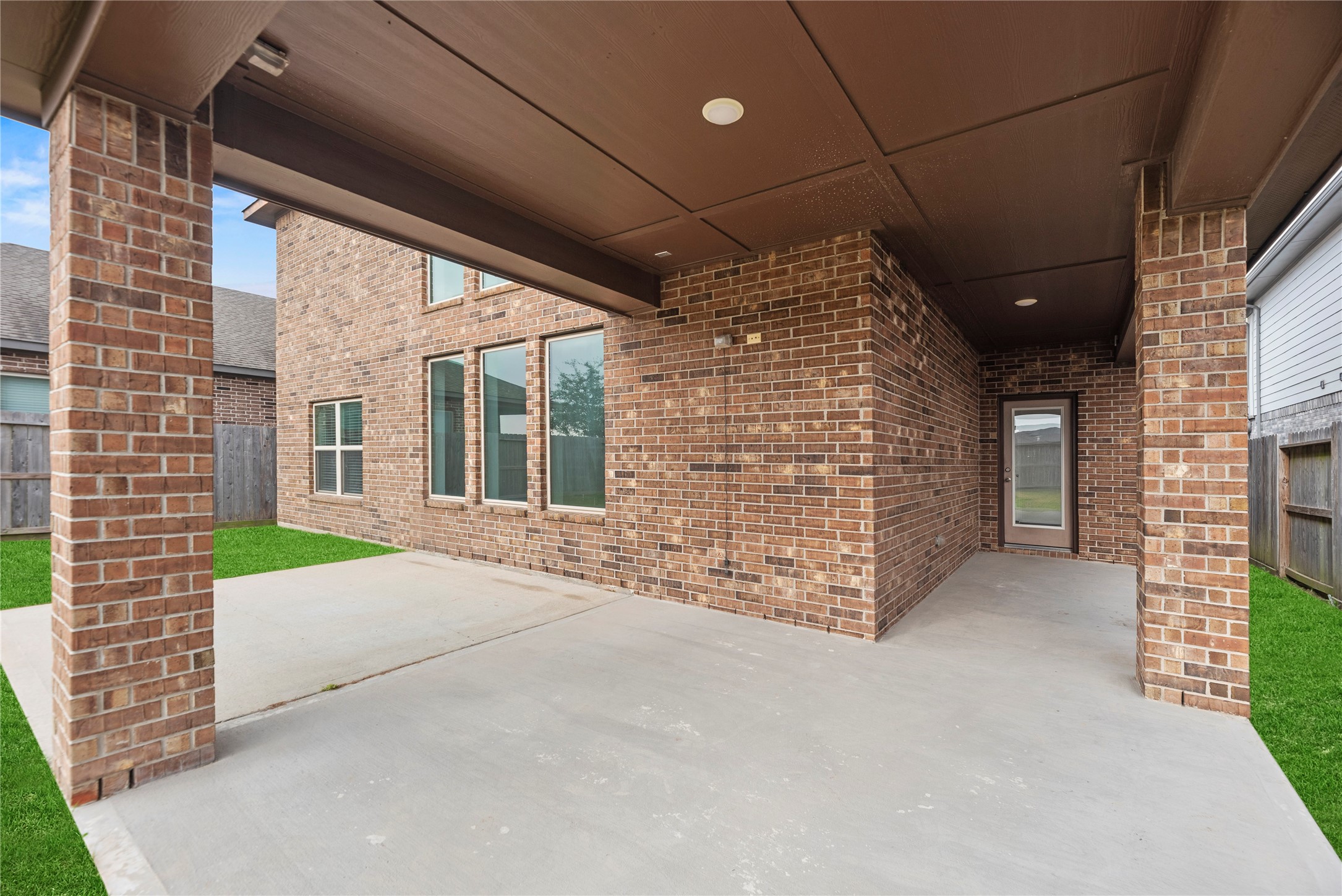11734 Deepwater Ridge Way Cypress, TX 77433 - Photo 27 of 35 a view of entrance gate of a building