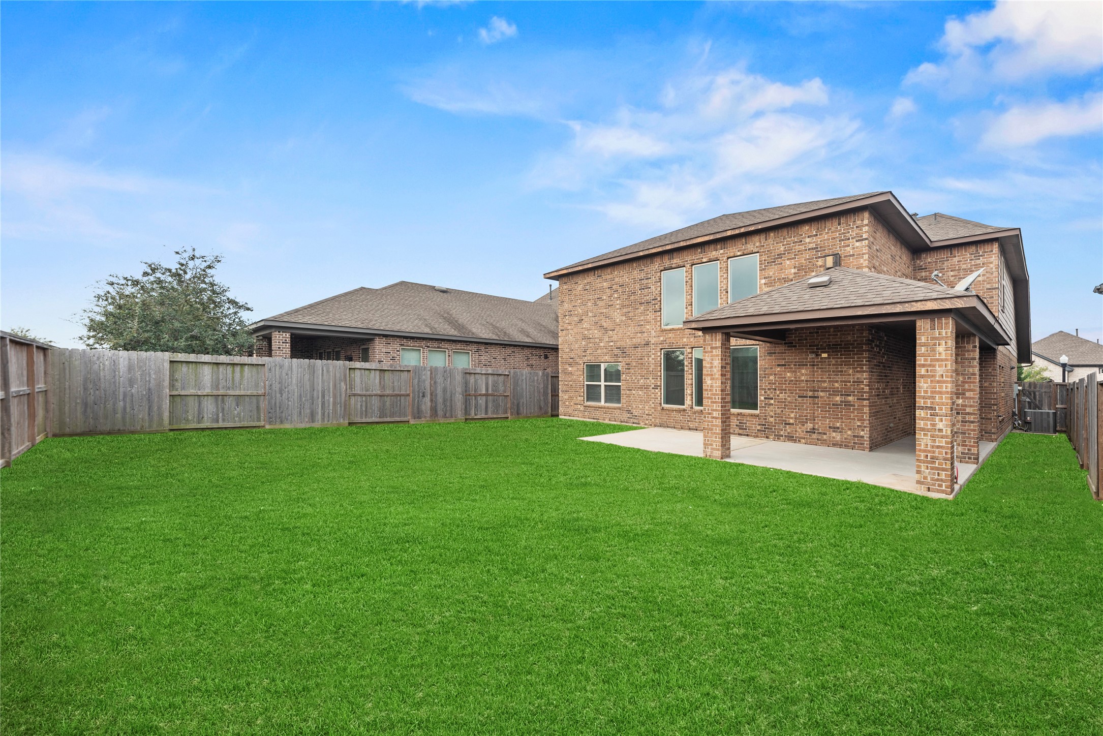 11734 Deepwater Ridge Way Cypress, TX 77433 - Photo 28 of 35 a view of a house with a back yard