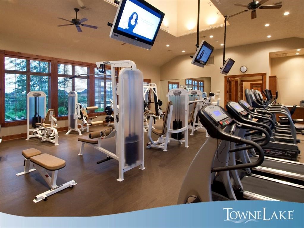 11734 Deepwater Ridge Way Cypress, TX 77433 - Photo 32 of 35 a view of a room with gym equipment