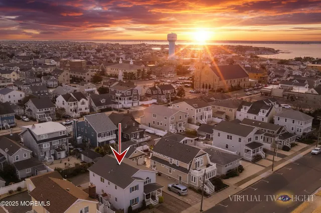 a bathroom with a shower and a sink