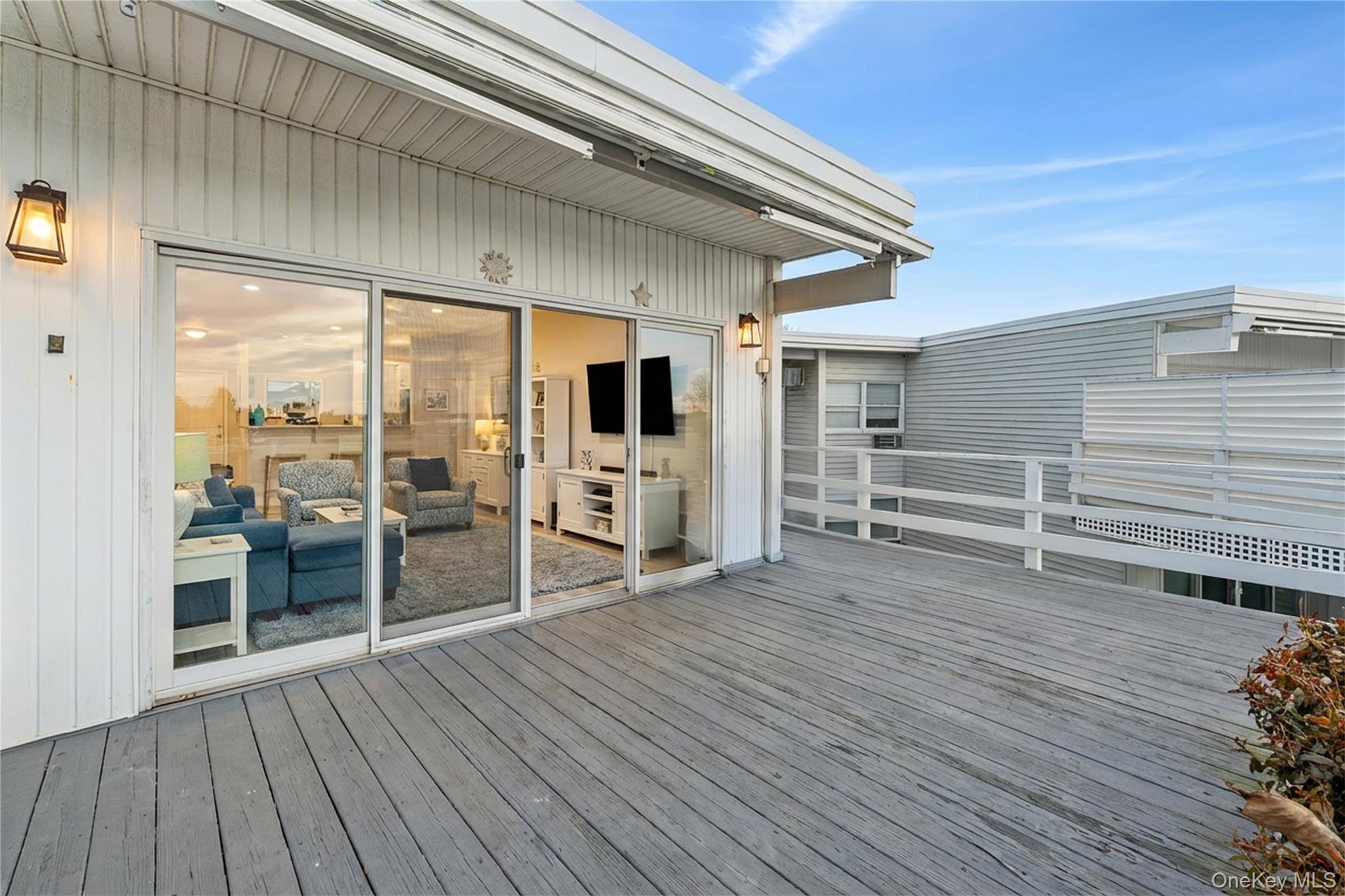 35 Library Avenue, Unit 3L Westhampton Beach, NY 11978 - Photo 11 of 12 a view of a hardwood floor and entryway in a room
