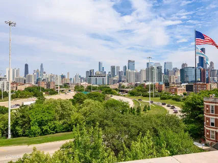a view of a city with tall buildings