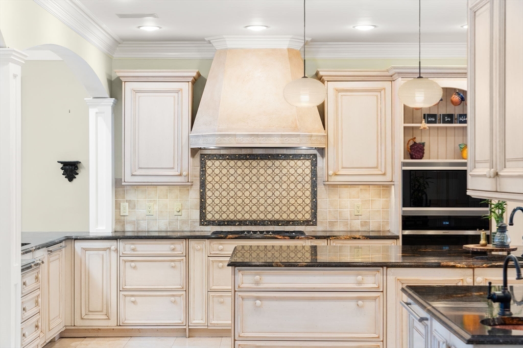 5 Hamlins Crossing West Dover, MA 02030 - Photo 13 of 40 a kitchen with granite countertop white cabinets and white appliances