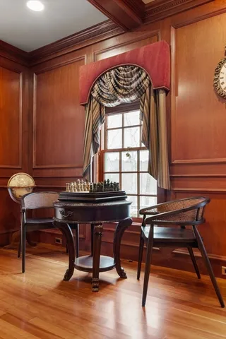 a spacious bedroom with a large bed and a large window